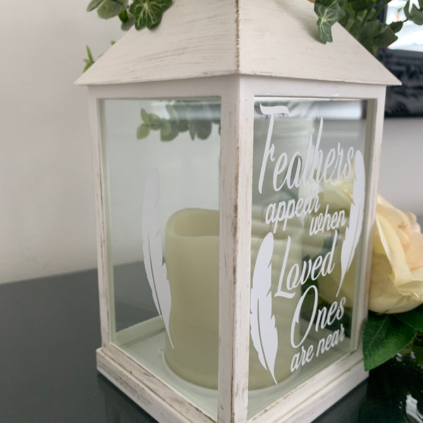 Memorial Lantern, Flickering Candle, Feathers Appear when Loved Ones are near.